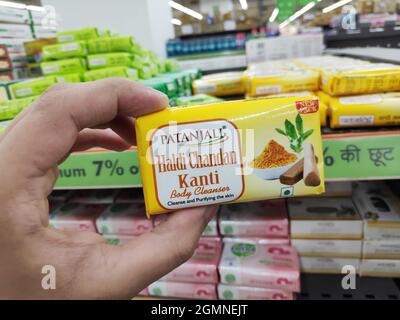 New Delhi, India - April 20, 2020: Patanjali soap in hand at supermarket Stock Photo