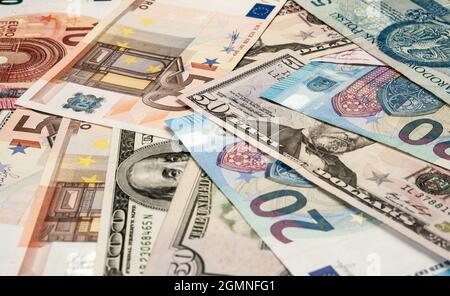 close up image of banknotes of different currencies Stock Photo