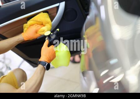 Professional seat wash with steam cleaner closeup. Detailing car