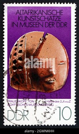 GDR - CIRCA 1978: a stamp printed in GDR shows Woman's Head, Ceramic, African Art from 1st Centuries in Leipzig Egyptian Museum, circa 1978 Stock Photo