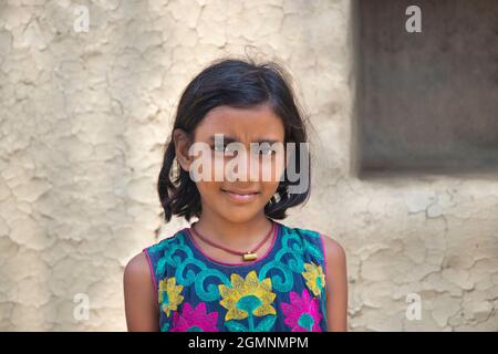 Indian rural Girl Standing at home Stock Photo