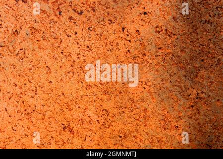 Orange abstract background close-up of natural African earthy stone Stock Photo