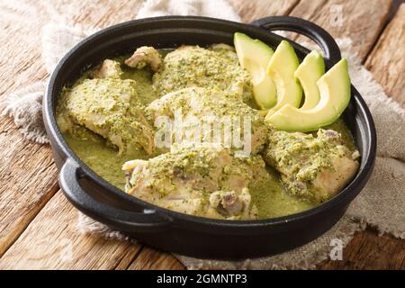 Guatemalan jocon de pollo with tomatillo sauce close up in the plate on the table. Horizontal Stock Photo