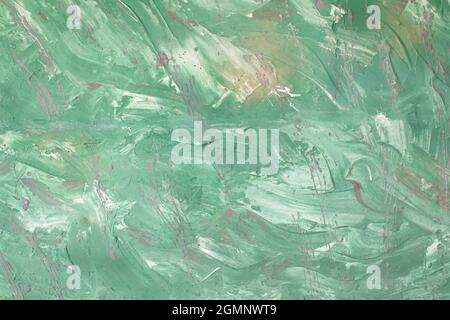 Green background with dynamic paint strokes and malachite splashes. Spring or summer background. Drawn. Copy space Stock Photo