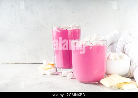 Pink beetroot latte, beets hot chocolate with marshmallow, modern sweet organic vegan drink Stock Photo