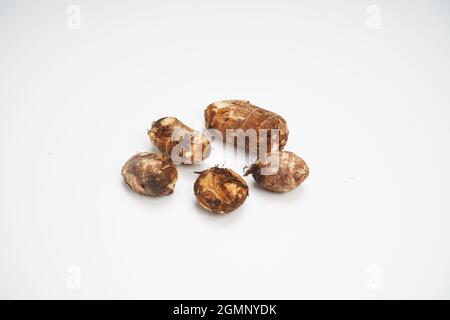 Taro roots isolated on white background Stock Photo