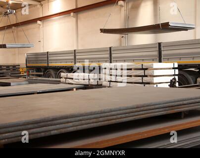 New metal sheets. Loading goods on the truck. Stock Photo