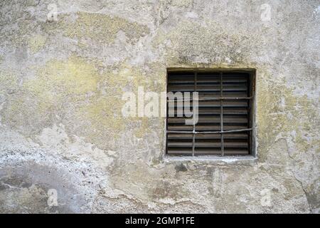 Small window in a rustic building Stock Photo