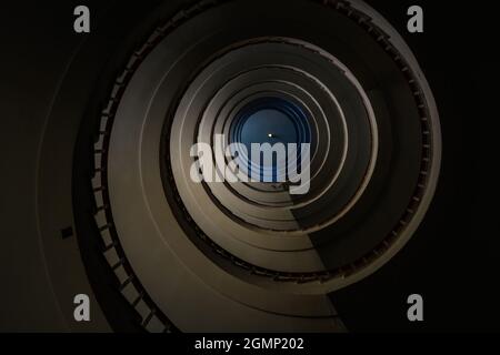looking up at a Spiral staircase Stock Photo