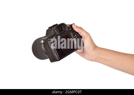 Digital camera in hand isolated on white background, hand holding digital camera Stock Photo