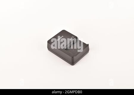Sony Camera Battery Charger Isolated on White Background Stock Photo