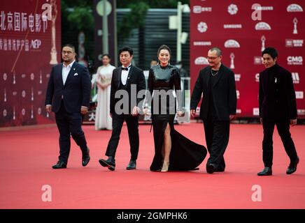 Beijing, China. 20th Sep, 2021. Jury members of the Tiantan Awards Gong Li (C), Chen Kun (1st R), Chen Zhengdao (1st L), Wuershan (2nd R) and Zhang Songwen walk on the red carpet for the 11th Beijing International Film Festival in Beijing, capital of China, Sept. 20, 2021. Credit: Chen Zhonghao/Xinhua/Alamy Live News Stock Photo