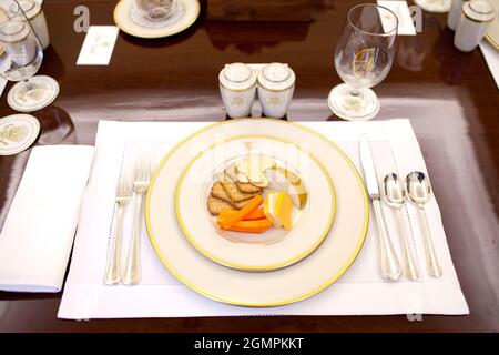 A simple plate of cheese, crackers and carrots is set for for the table setting of the meeting of closed, off-the-record lunch with President Barack Obama and Press Secretary Robert Gibbs in the President's Private Dining Room. Photo by Pete Souza Stock Photo