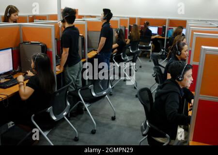 The night shift at the Visaya Knowledge Process Outsourcing (VKPO) call center, in Makati. Stock Photo