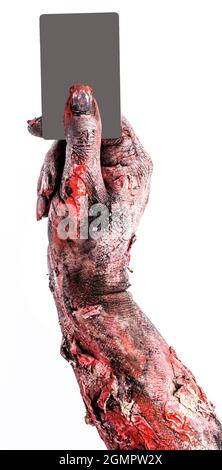 zombie hand holding a credit card mockup, use advertisement or promotion for halloween theme. Stock Photo