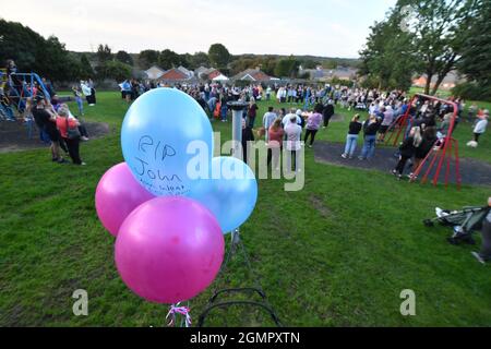 Members of the public attend a vigil near to the scene in Chandos Crescent, Killamarsh, near Sheffield, where four people were found dead at a house on Sunday. Picture date: Monday September 20, 2021. Stock Photo