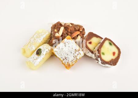 Doda, anjeer barafi and kaju roll on white background Stock Photo