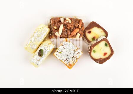 Doda, anjeer barafi and kaju roll on white background Stock Photo