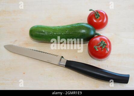 Vegetables in the form of cucumbers and tomatoes  symbolize Stock Photo