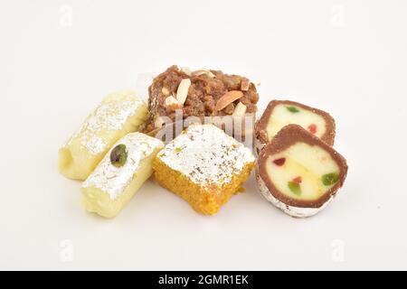 Doda, anjeer barafi and kaju roll on white background Stock Photo
