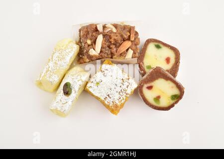 Doda, anjeer barafi and kaju roll on white background Stock Photo