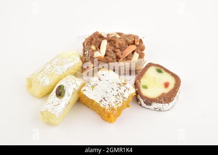 Doda, anjeer barafi and kaju roll on white background Stock Photo
