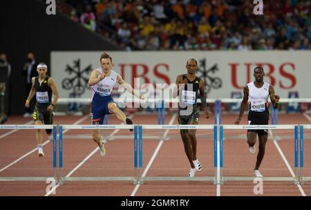 ZURICH - SWITZERLAND 8 SEP 21: Karsten Warholm (NOR) Alison dos Santos (BRA) and Kyron McMaster (IVB) competing in the 400m hurdles at the Wanda Diamo Stock Photo