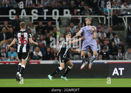 NEWCASTLE UPON TYNE. SEPT 17TH Leeds United's Patrick Bamford contests a header with Newcastle United's Ciaran Clark during the Premier League match between Newcastle United and Leeds United at St. James's Park, Newcastle on Friday 17th September 2021. (Credit: Mark Fletcher | MI News) Credit: MI News & Sport /Alamy Live News Stock Photo