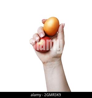 Easter eggs in female hand isolated on white background. Clipping path. Stock Photo