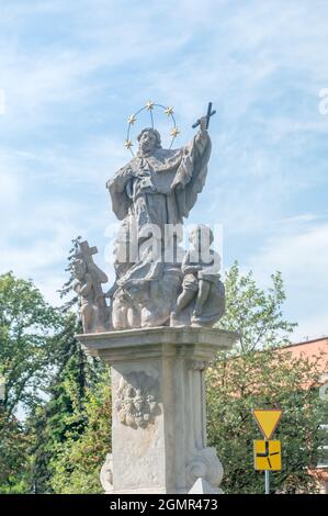 Rybnik, Poland - June 4, 2021: Sculpture of John of Nepomuk (or John Nepomucene) at church square in Rybnik. Stock Photo