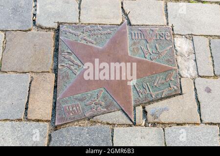 Opole, Poland - June 4, 2021: Star of Universe Polish band at Walk of Fame in Opole known as Aleja Gwiazd Festiwalu Polskiej Piosenki. Stock Photo
