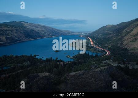 Landscape of the Columbia River surrounded by hills in the evening in Oregon, the USA Stock Photo