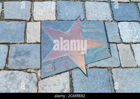 Opole, Poland - June 4, 2021: Star of Marek Dutkiewicz at Walk of Fame in Opole known as Aleja Gwiazd Festiwalu Polskiej Piosenki. Marek Dutkiewicz is Stock Photo