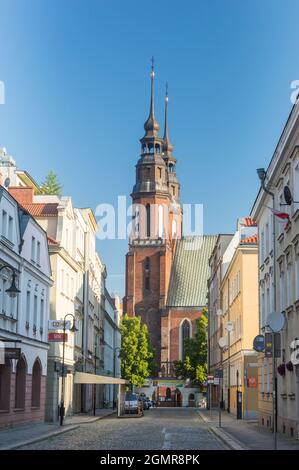 Opole, Poland - June 4, 2021: Bronislawa Koraszewskiego street with Cathedral Basilica of the Exaltation of the Holy Cross (Polish: Bazylika katedraln Stock Photo