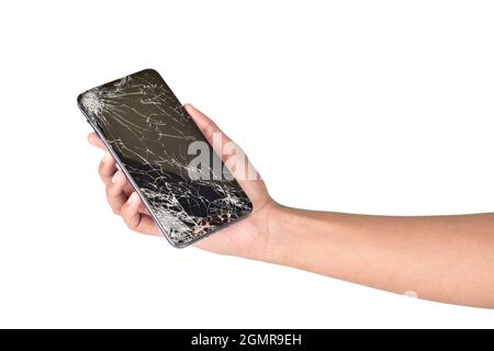 Broken display smartphone in hand isolated on white background with clipping path Stock Photo
