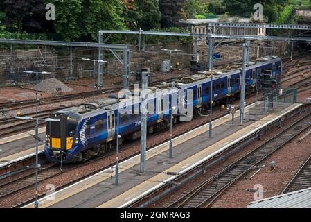 Scotrail train arriving at Waverley Station, Edinburgh, Scotland, UK. Stock Photo