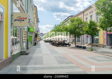 Zilina, Slovakia - June 5, 2021: Narodna pedestrian street in the center of Zilina. Stock Photo