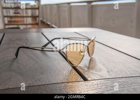 Polyrazaionic glasses sailing yacht, holiday leisure tourism water young, sport sitting. Sailboat leaving voyage, hip tourists seascape cruise liner l Stock Photo