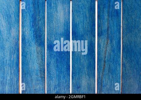 Closeup of blue wooden stripes isolated on white background, top view of blue wood plank texture background Stock Photo