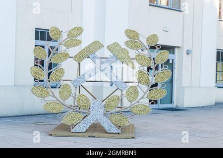 Walbrzych, Poland - June 3, 2021: Hammer and pick, symbol of mining at old coal mine. Stock Photo