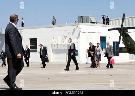 President Barack Obama and White House staff members prepare to leave Des Moines Airport April 22, 2009, following a visit to Newton, Iowa.  Official White House Photo by Pete Souza Stock Photo