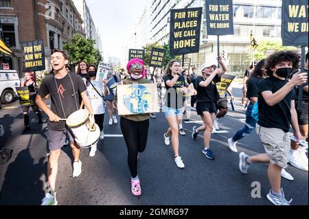 Washington, United States. 20th Sep, 2021. Marchers hold placards during a Sunrise Movement 'March on Congress for Bold Climate Action'. Credit: SOPA Images Limited/Alamy Live News Stock Photo