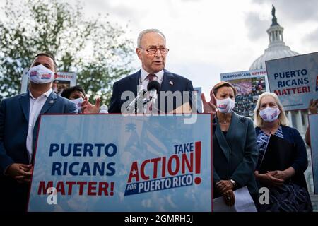 Washington, USA. 20th Sep, 2021. UNITED STATES - SEPTEMBER 20: Senate Majority Leader Charles Schumer, D-N.Y., conducts a news conference outside the U.S. Capitol titled “Take Action for Puerto Rico,” on the 4th anniversary of Hurricane Maria on Monday, September 20, 2021. Rep. Darren Soto, D-Fla., left, Sen. Kirsten Gillibrand, D-N.Y., right, and Rep. Nydia Velazquez, D-N.Y., also attended. (Photo By Tom Williams/Pool/Sipa USA) Credit: Sipa USA/Alamy Live News Stock Photo