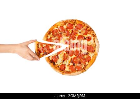 Hand taking a slice of pizza. Big paperoni pizza without one piece. Top view on paperoni pizza. Concept for italian food, street food, fast food Stock Photo