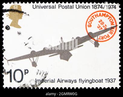 MOSCOW, RUSSIA - NOVEMBER 6, 2019: Postage stamp printed in United Kingdom shows Imperial Airways Short S.21 Flying Boat Maia, 1937, U.P.U. (Universal Stock Photo