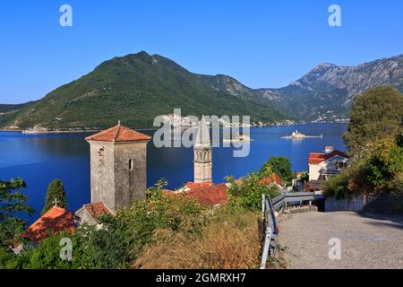 Panoramic view from the old town of Perast across Our Lady of the Rocks Islet and Sveti Dorde Islet in the Bay of Kotor, Montenegro Stock Photo