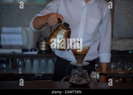 Man Has Put a Drip Coffee at Japanese style Cafe Stock Photo