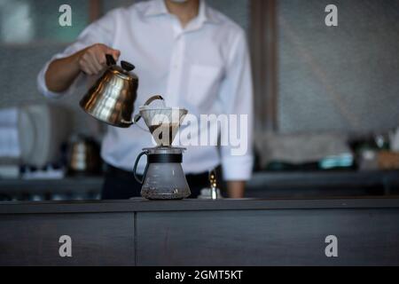 Man Has Put a Drip Coffee at Japanese style Cafe Stock Photo