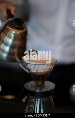 Man Has Put a Drip Coffee at Japanese style Cafe Stock Photo