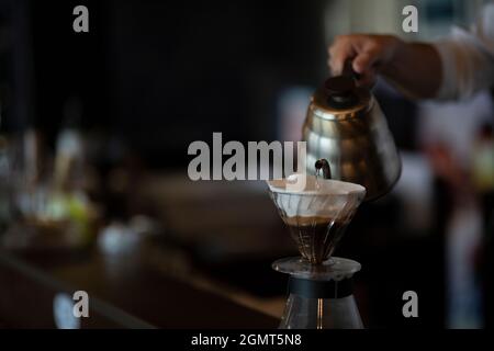 Man Has Put a Drip Coffee at Japanese style Cafe Stock Photo